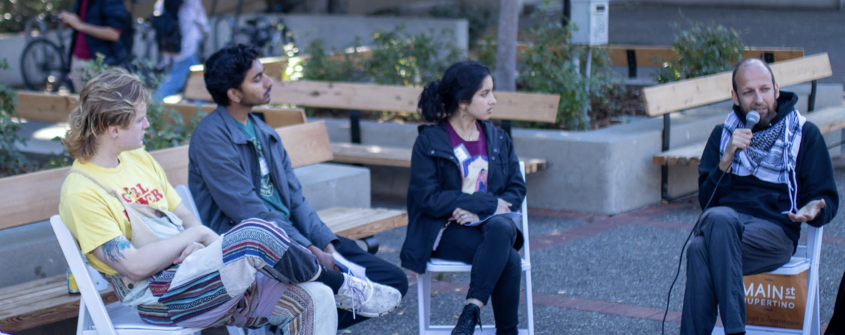 Students sitting in a circle at '24 at a Climate Justice Week event