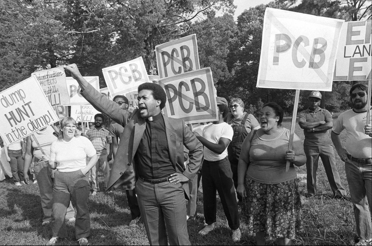 Protestors holding signs