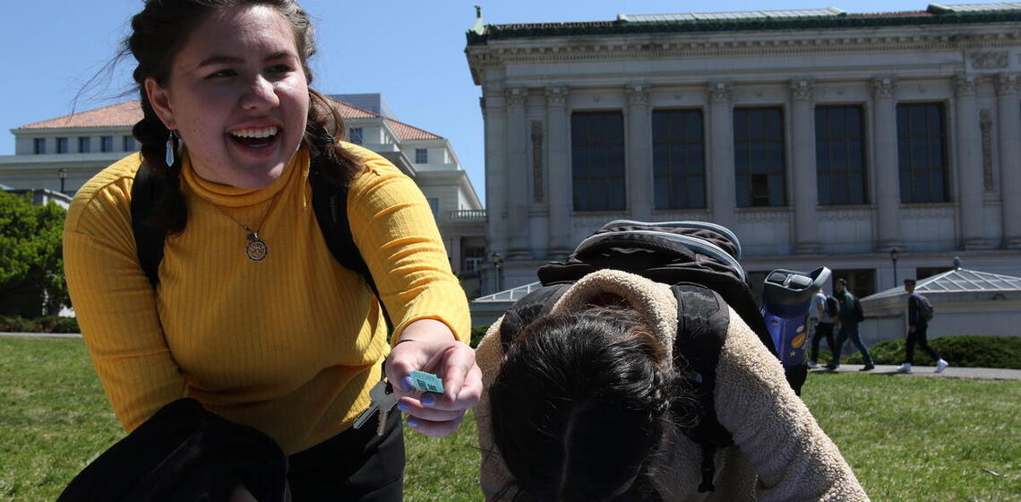 Two people laughing on Memorial Glade