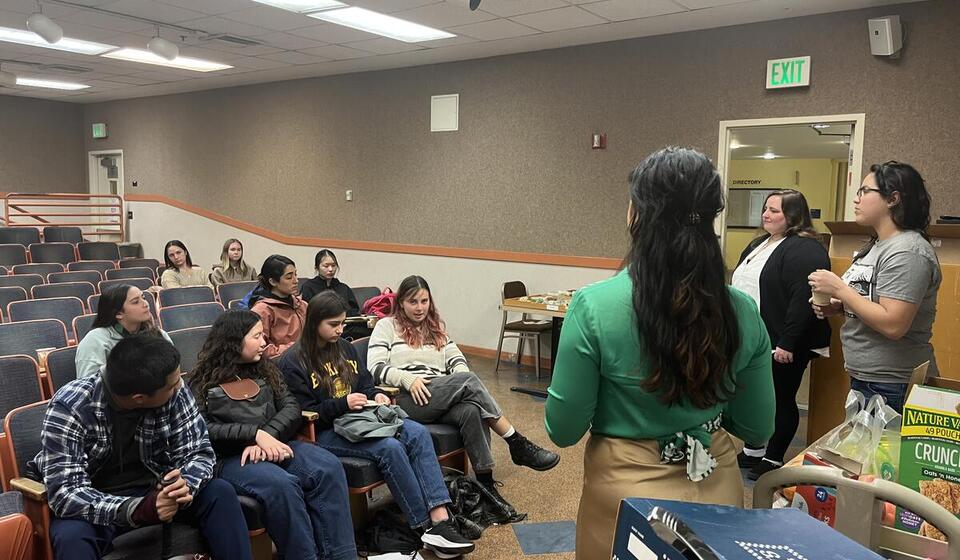 Students sitting in a classroom attending a seminar